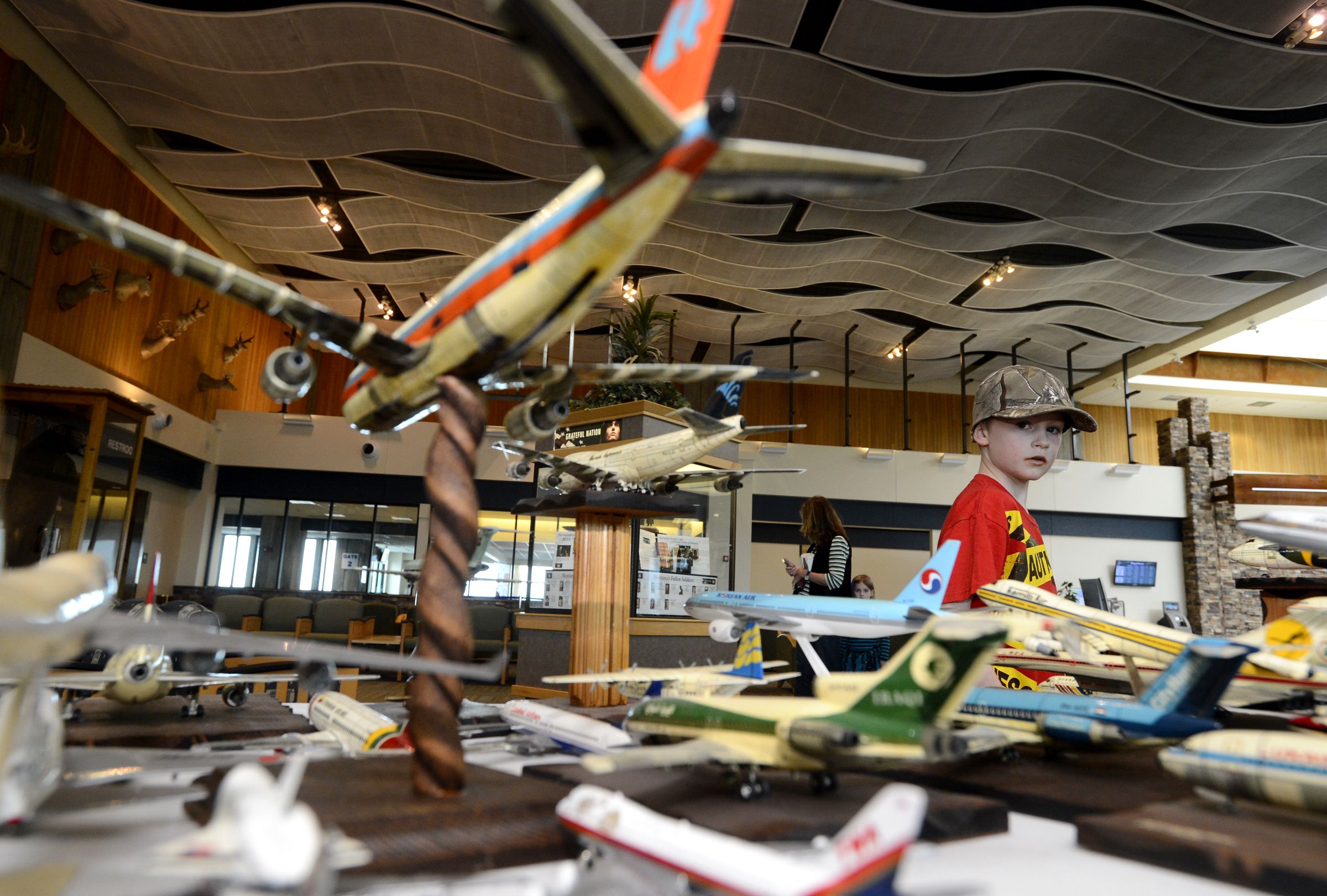 Dawson Utterback,  8, checks out the <a href='https://www.modelairplane.com/link/modelairplane'>model airplane</a> collection, put together by the late Bary Poletto, on display at the Great Falls International Airport.