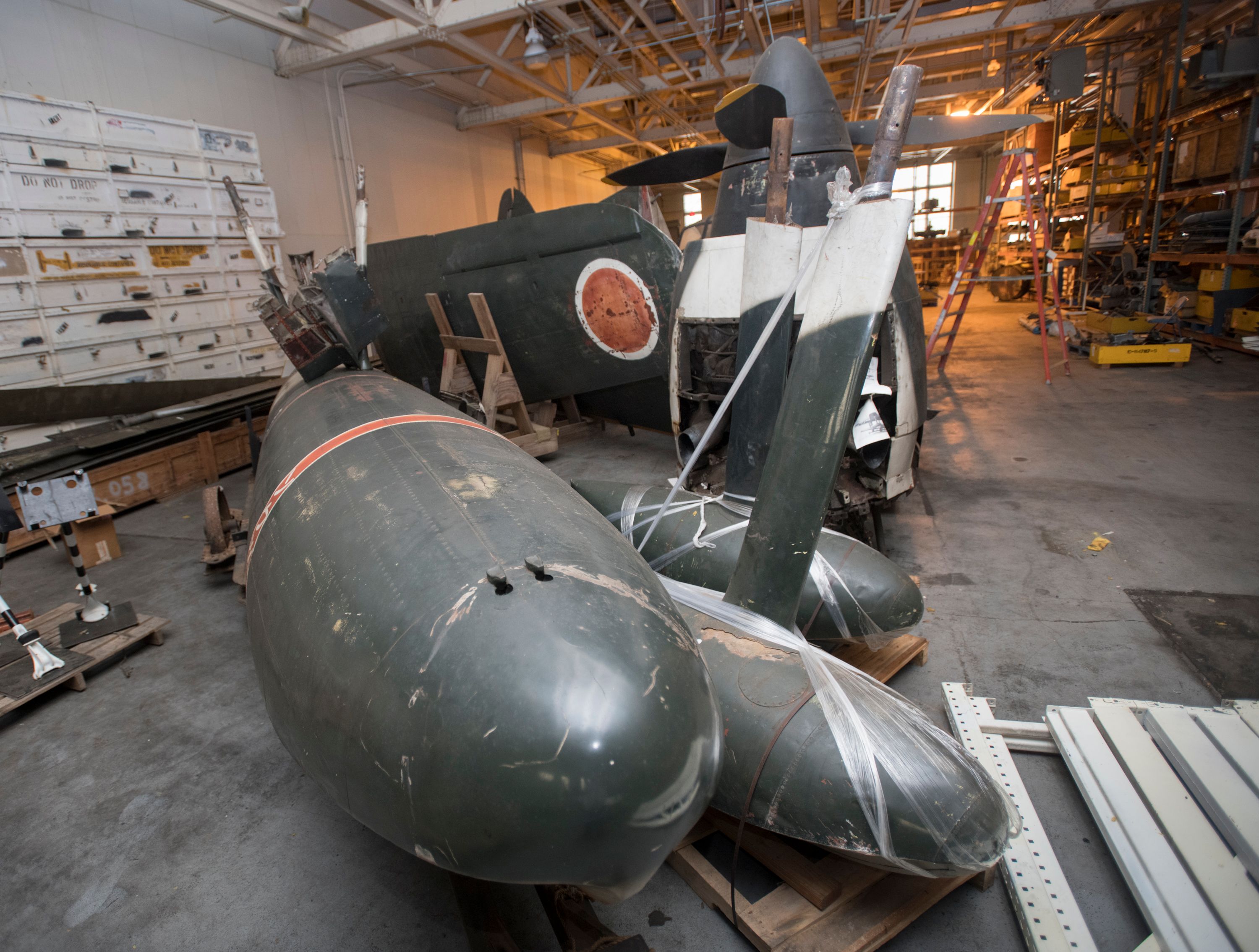 Unrestored parts of a Japanese NIK Kyofu aircraft, codenamed Rex by the Allies, are stored in a National Naval Aviation Museum warehouse at Naval Air Station Pensacola on Thursday, March 14, 2019.  Only 97 NIK Kyofu aircraft were manufactured<p>Article source: <a href=