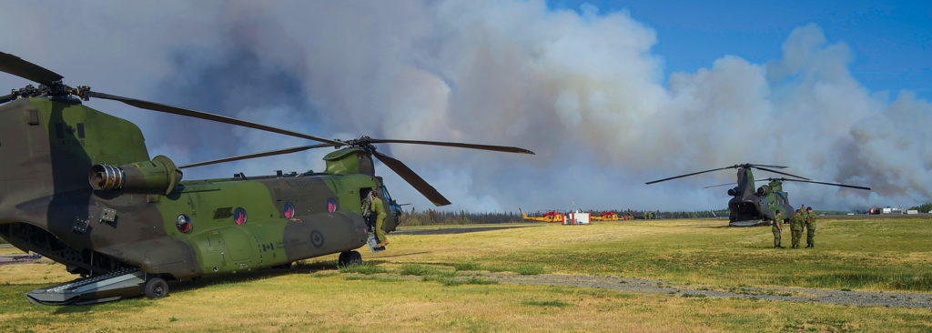 CH-147 Chinooks and CH-146 Griffons standby at Williams Lake Airport for a possible evacuation of the Williams Lake region during Operation Lentus in British Columbia in 2017. Cpl Gabrielle DesRochers Photo